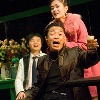 Colour photograph of a performance of The Playboy of the Western World by Pan Pan Theatre Company in the Orienal Pioneer Theatre, Beijing