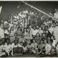 Black and white photograph of the cast and crew of 'The River' on Location in India , including Arthur Shields and Director Jean Renoir.
