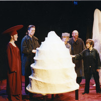 Colour photograph of the entire cast on stage during a performance of Madamoiselle Flic Flac in the Red Room by Pan Pan Theatre Company