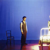 Colour photograph of three actors in The Man With Two Kisses by Pan Pan Theatre Company