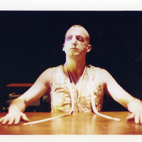 Colour photograph of Charles Kelly as 'The Master' in Tailors Requiem by Pan Pan Theatre Company