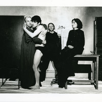 Black-and-white photograph of a performance of Tailors Requiem by Pan Pan Theatre Company