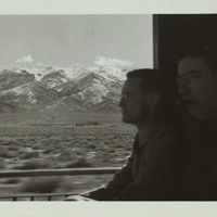Black and white photograph of Arthur Shields and F.R. Higgins on a train in the United States.