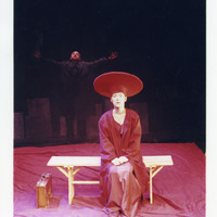 Colour photograph of Charles Kelly and Mary o'Driscoll in Madamoiselle Flic Flac in the Red Room by Pan Pan Theatre Company