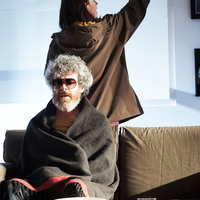 Colour photograph of Andrew Bennett (bottom) and Judith Roddy (top) in Everyone is King Lear in His Own Home by Pan Pan Theatre Company