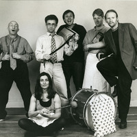 Black-and-white photograph of the cast and director (Gavin Quinn) of Peepshow by Pan Pan Theatre Company