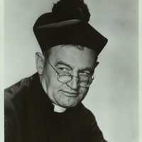 Black and white photograph of Barry Fitzgerald dressed as a priest.